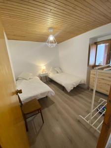 Posteľ alebo postele v izbe v ubytovaní Apartamento rural Meaus