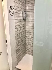 a shower with a glass door in a bathroom at Galicia47 in Zamora +22 photos