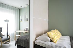 Postel nebo postele na pokoji v ubytování Boutique Hotel Yöpuu
