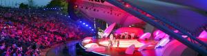 a stage with a show in front of a crowd of people at Apartament Green Mrągowo-Mazury,blisko plaża, centrum! Wi-fi! in Mrągowo