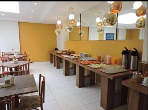 ห้องอาหารหรือที่รับประทานอาหารของ Hotel Belas Artes
