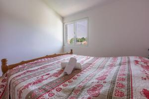 Postel nebo postele na pokoji v ubytování Apartments Lino