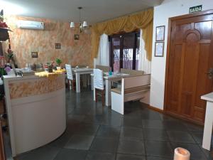 Posezení v ubytování Pousada Unser Haus