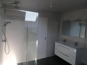 a bathroom with a shower and a sink at La Voilerie in Fécamp +19 photos