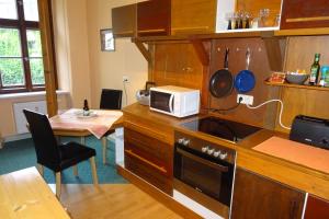 Η κουζίνα ή μικρή κουζίνα στο Müllers zweite Ferienwohnung in der Altstadt von Görlitz