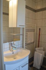 Kúpeľňa v ubytovaní Rooms & Apartments Kvasić