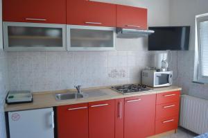 Kuchyňa alebo kuchynka v ubytovaní Rooms & Apartments Kvasić