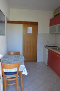 Kuchyňa alebo kuchynka v ubytovaní Rooms & Apartments Kvasić