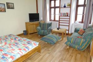 Μια τηλεόραση ή/και κέντρο ψυχαγωγίας στο Müllers zweite Ferienwohnung in der Altstadt von Görlitz