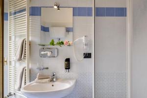 Ett badrum på Hotel San Francesco e il lupo