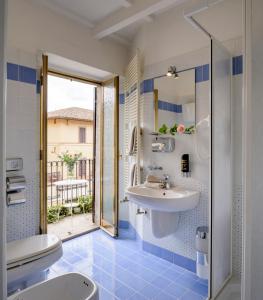 Phòng tắm tại Hotel San Francesco e il lupo