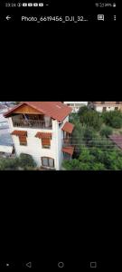 two pictures of a building with a roof at oniron in Sidirokastro