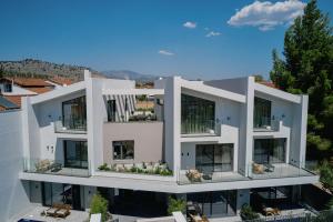 an aerial view of a white apartment building at Origami Boutique Residences in Nafplio