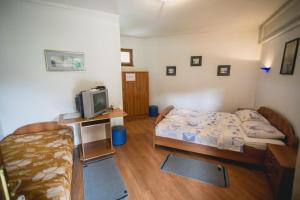 En eller flere senger på et rom på Pool and Villa Splav Dunavac
