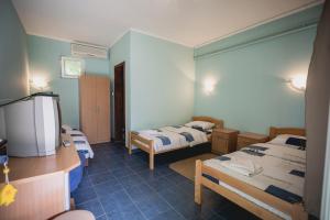 En eller flere senger på et rom på Pool and Villa Splav Dunavac