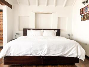 A bed or beds in a room at CASA DE LAS MATERAS