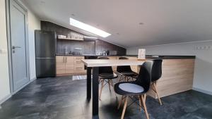 Fotografie z fotogalerie ubytování Mansarda v destinaci Kamenec Podolský