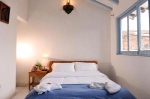 Laureles de la Villa客房内的一张或多张床位