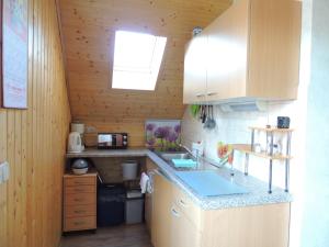 Küche/Küchenzeile in der Unterkunft Ferienwohnung Smiley