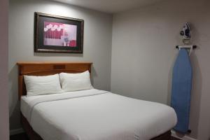 Ένα ή περισσότερα κρεβάτια σε δωμάτιο στο Thunderbird Motel Las Vegas/ New Mexico