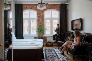 Televiisor ja/või meelelahutuskeskus majutusasutuses Hotel Continental Relax & Spa