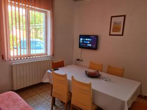 TV a/nebo společenská místnost v ubytování Guest House Barba