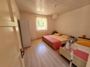Postel nebo postele na pokoji v ubytování Guest House Barba