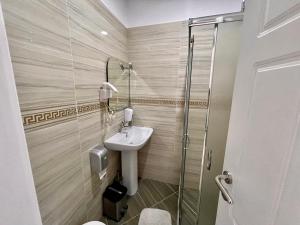 Koupelna v ubytování Vila Ada Hotel