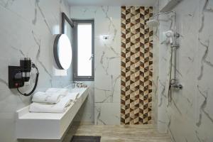 Phòng tắm tại GreyStone Suites