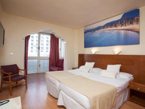 Postel nebo postele na pokoji v ubytování Magic Villa de Benidorm