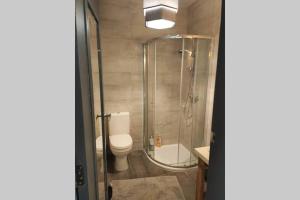 Kopalnica v nastanitvi REBAK PLACE- A Bright & charming getaway