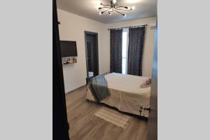 Postelja oz. postelje v sobi nastanitve REBAK PLACE- A Bright & charming getaway