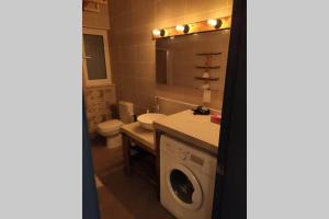 Kopalnica v nastanitvi REBAK PLACE- A Bright & charming getaway