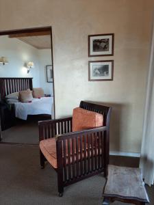 Rúm í herbergi á Leeuwenbosch Shearers Lodge - Amakhala Game Reserve