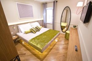 Posteľ alebo postele v izbe v ubytovaní Borelli Palace & Borelli Blue
