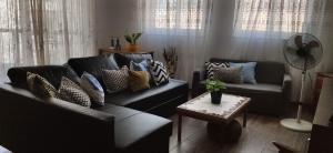Predel za sedenje v nastanitvi REBAK PLACE- A Bright & charming getaway