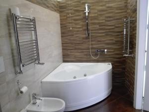 Kúpeľňa v ubytovaní Atmos Luxe Navigli