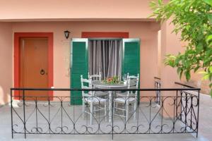 A balcony or terrace at Seaside Villa Alexandra,Acharavi.