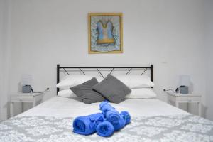 A bed or beds in a room at Seaside Villa Alexandra,Acharavi.