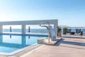 Бассейн в Michelangelo Resort & Spa или поблизости