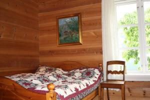 Säng eller sängar i ett rum på Drengastova Hardangerfjord
