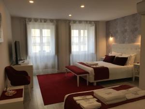 Postel nebo postele na pokoji v ubytování ÍSIS Guest House