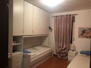 Giường trong phòng chung tại Rosa in Fiore