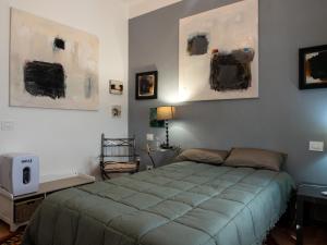 Postel nebo postele na pokoji v ubytování Cinque terre affittacamere Atelier ouvert!