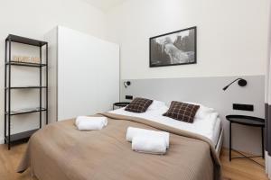 Posteľ alebo postele v izbe v ubytovaní Apartments Warsaw Gagarina by Noclegi Renters