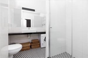 Kúpeľňa v ubytovaní Apartments Warsaw Gagarina by Noclegi Renters