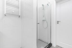 Kúpeľňa v ubytovaní Apartments Warsaw Gagarina by Noclegi Renters