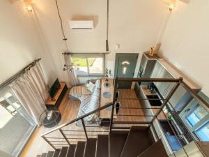 Televízia a/alebo spoločenská miestnosť v ubytovaní 2SEA LOFT NEA POTIDEA Chalkidiki