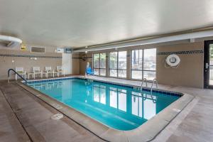 a large swimming pool in a building at Comfort Inn & Suites Fruita - Grand Junction in Fruita