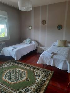 Postel nebo postele na pokoji v ubytování Casa Lola